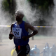 Tsepo Mathibelle runs in the men's marathon at the 2015 IAAF World Championships in Beijing.
